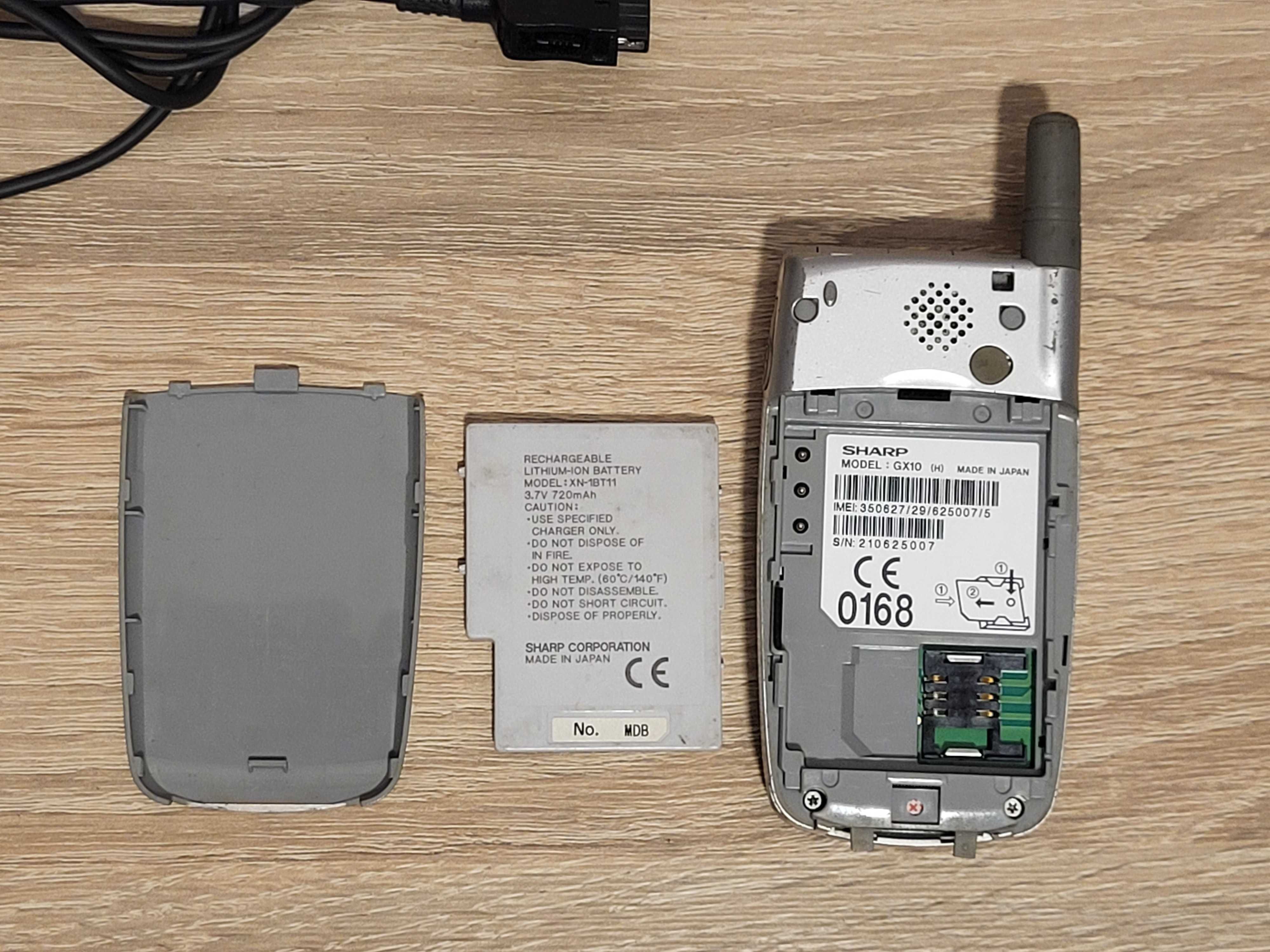 Telefon Sharp GX10 bateria ładowarka zestaw stary telefon