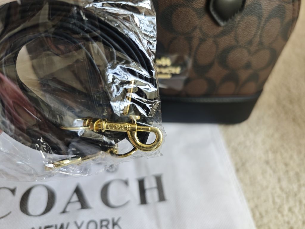 Mala Coach nova na caixa