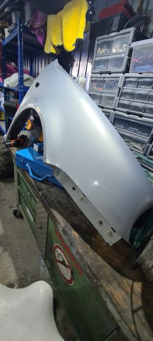 Błotnik przedni prawy vw golf 4 Oryginał