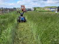 Koszenie trawników trawy nieużytków działek pod budowy lub na sprzedaż