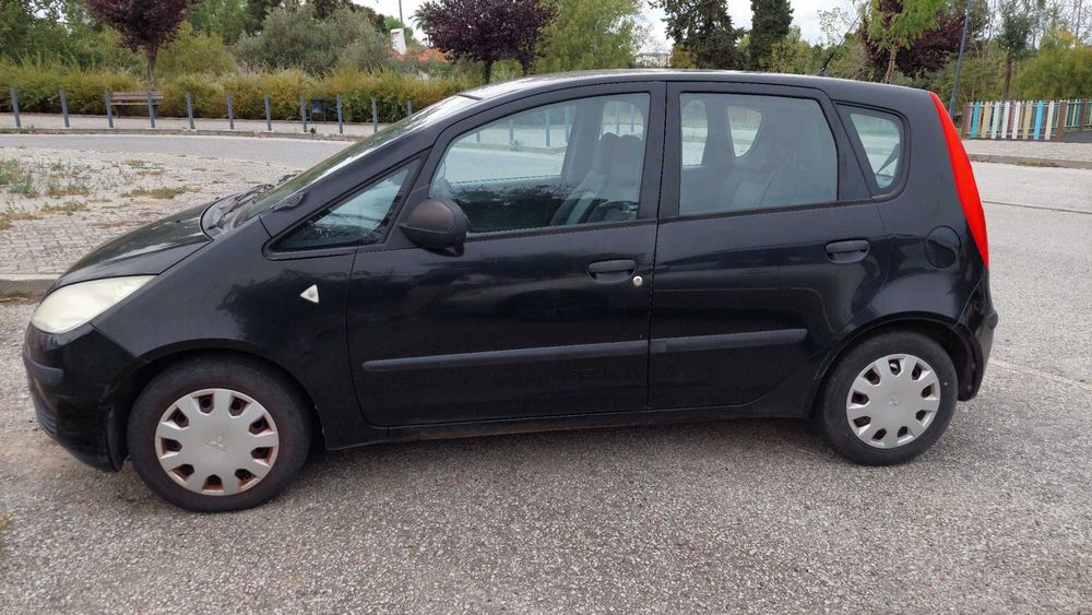 Mitsubishi Colt 1.1 2007 – Económico, fiável e em bom estado