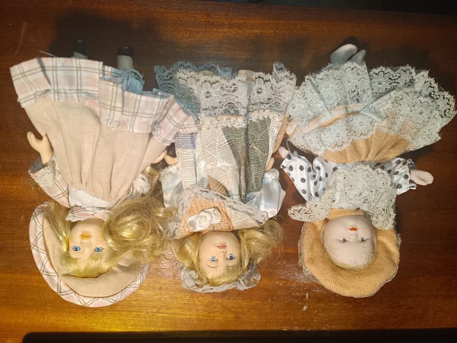 3 bonecas de porcelana