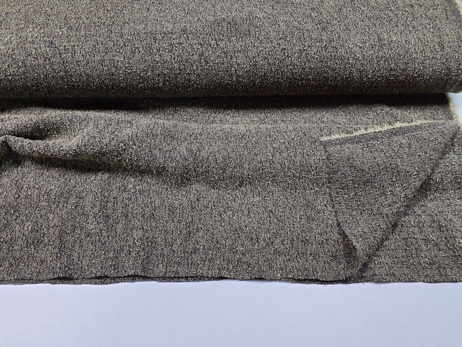 Tkanina grubsza zieleń melanż szer.142 cm.