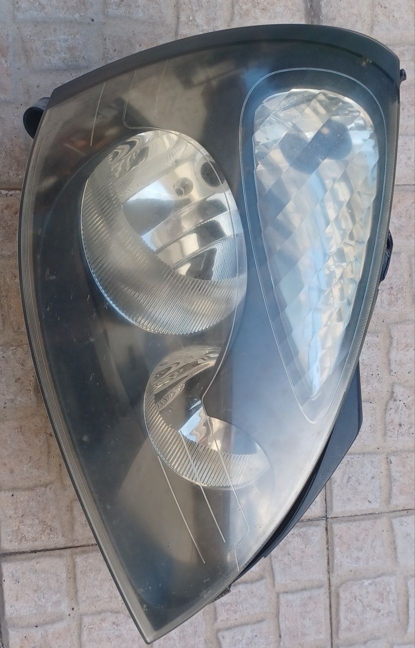 Farol dianteiro direito renault clio 2