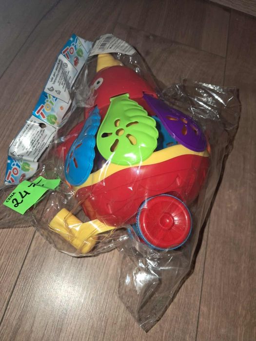 Zabawka kurczak do pchania