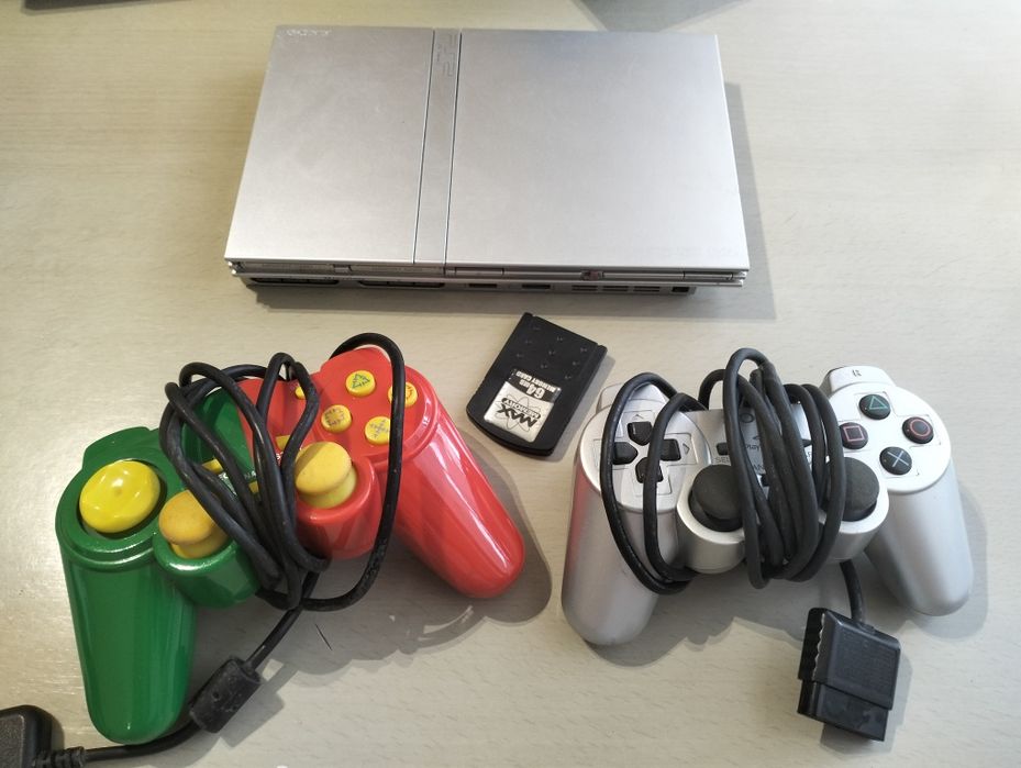 Ps2 Slim +2 comandos+10 jogos+ acessórios