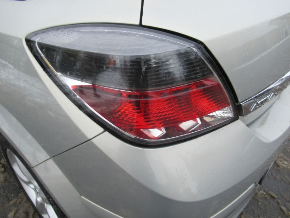 LAMPA TYŁ TYLNA LEWA OPEL ASTRA 3 III H LIFT 3D GTC 2006-