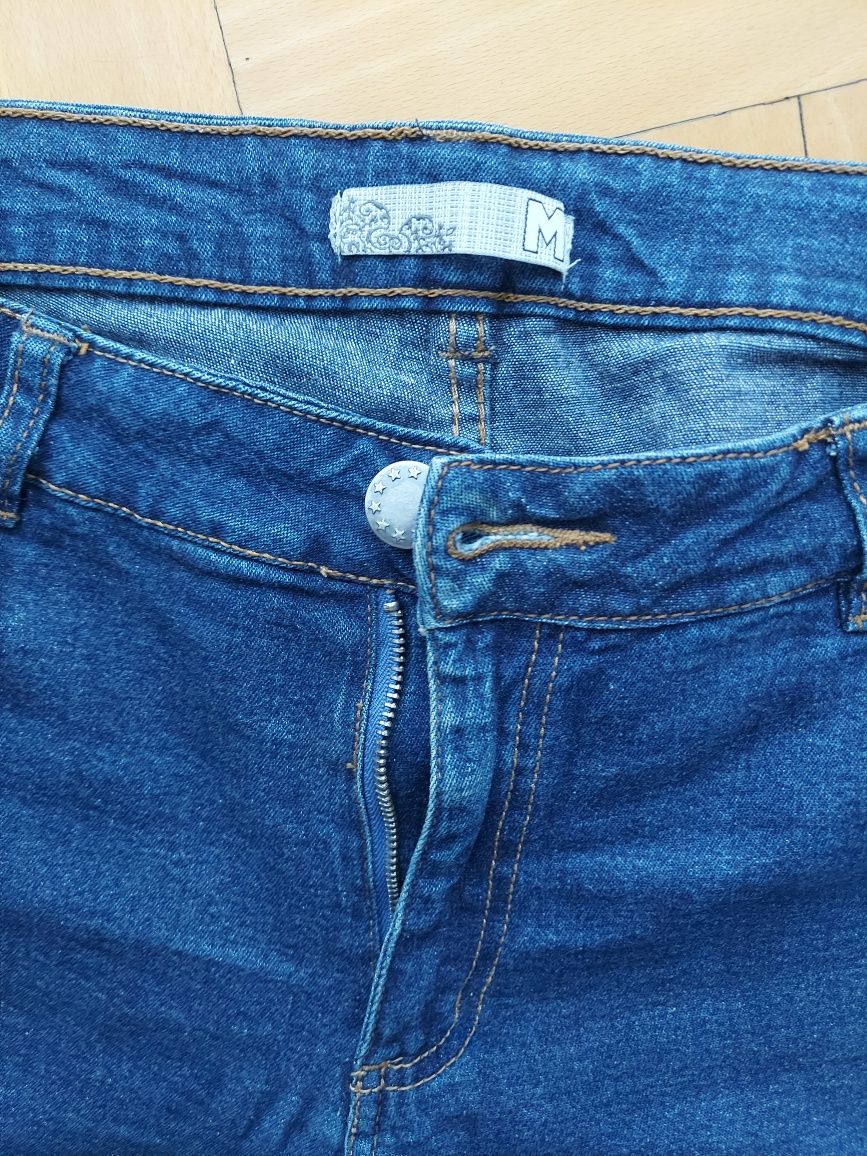 Granatowe jeansy niebieskie rurki do kostek