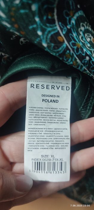 Elegancka zielona sukienka z wzorkami