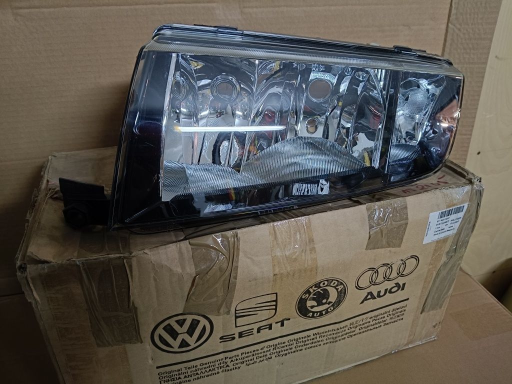 Reflektor Skoda Fabia OEM hella nowy