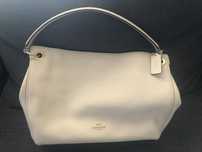 Carteira de luxo Coach