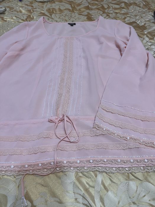 Подарую блузку Xl