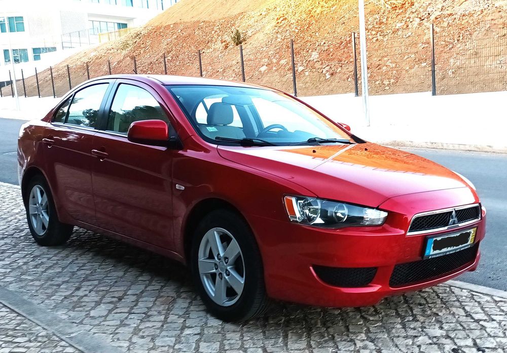 Mitsubishi Lancer 1.5 gasolina, 2009, só 121.800 Km. Excelente.