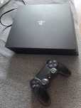 Playstation 4 pro + 2 gry red dead redemption 2 i wolfenstein