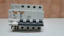 MERLIN GERIN - Disjuntor tetrapolar de 40A + bobine MX + contacto auxi