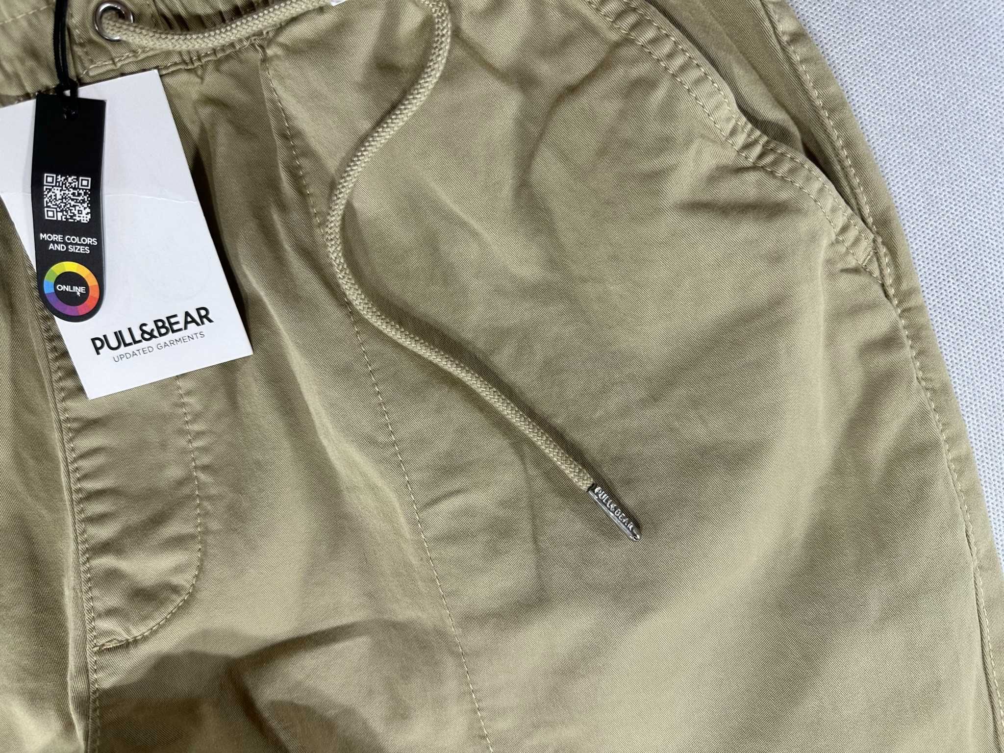 PULL & BEAR materiałowe spodnie beżowe jogger chino XL