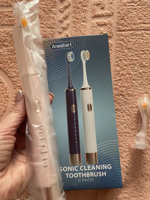 Електрична зубна щітка і насадки. США