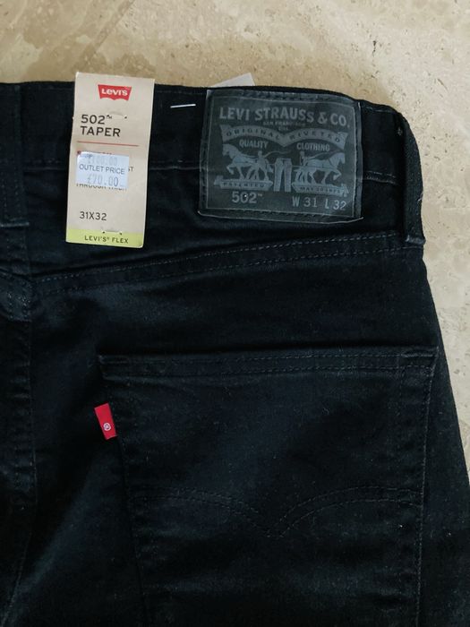 Męskie spodnie jeansy Levis 502 W31 /L 32