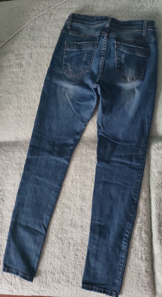 Damskie jeansy 38