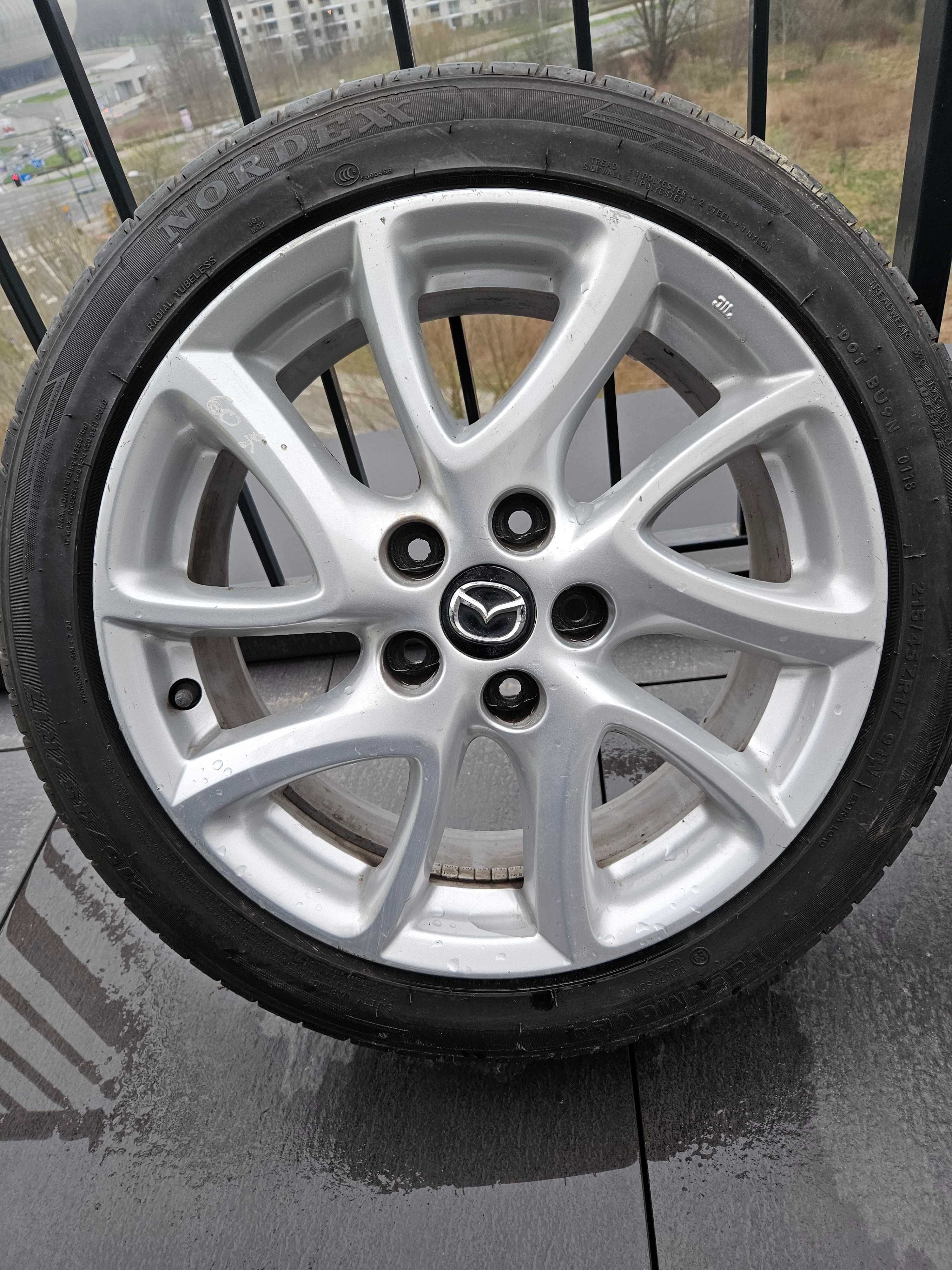 Felgi 17" z oponami letnimi 215/45 - Mazda