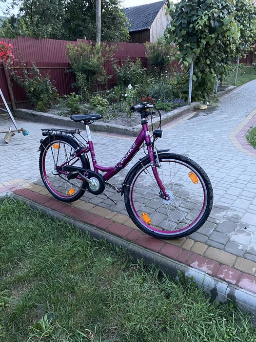 Велосипед жіночий, середнього розміру, та гарного стану