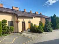 Apartament w domu szeregowym czterolokolowym