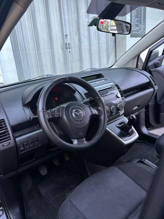 Mazda 5 7 lugares aceito troca por carro