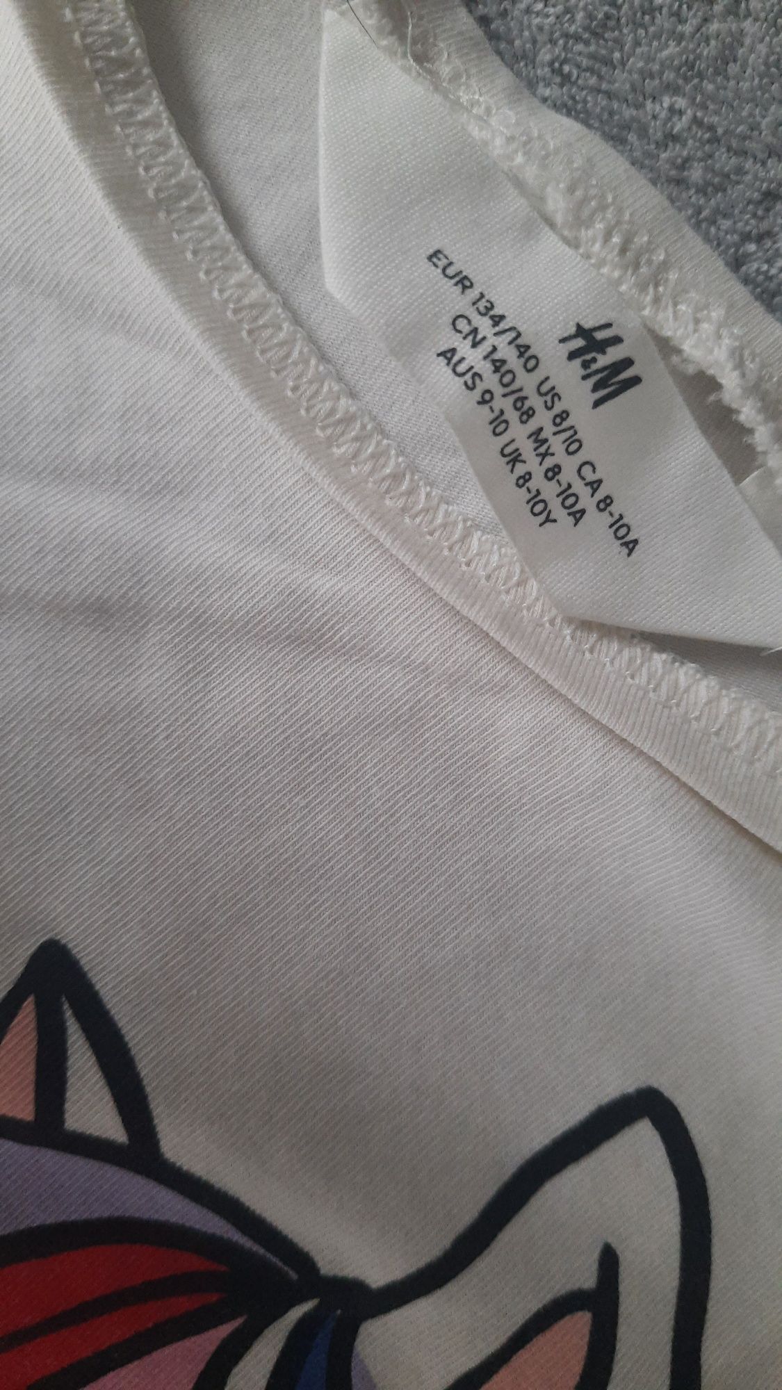 Bluzeczka H&M r.140 jednorozec