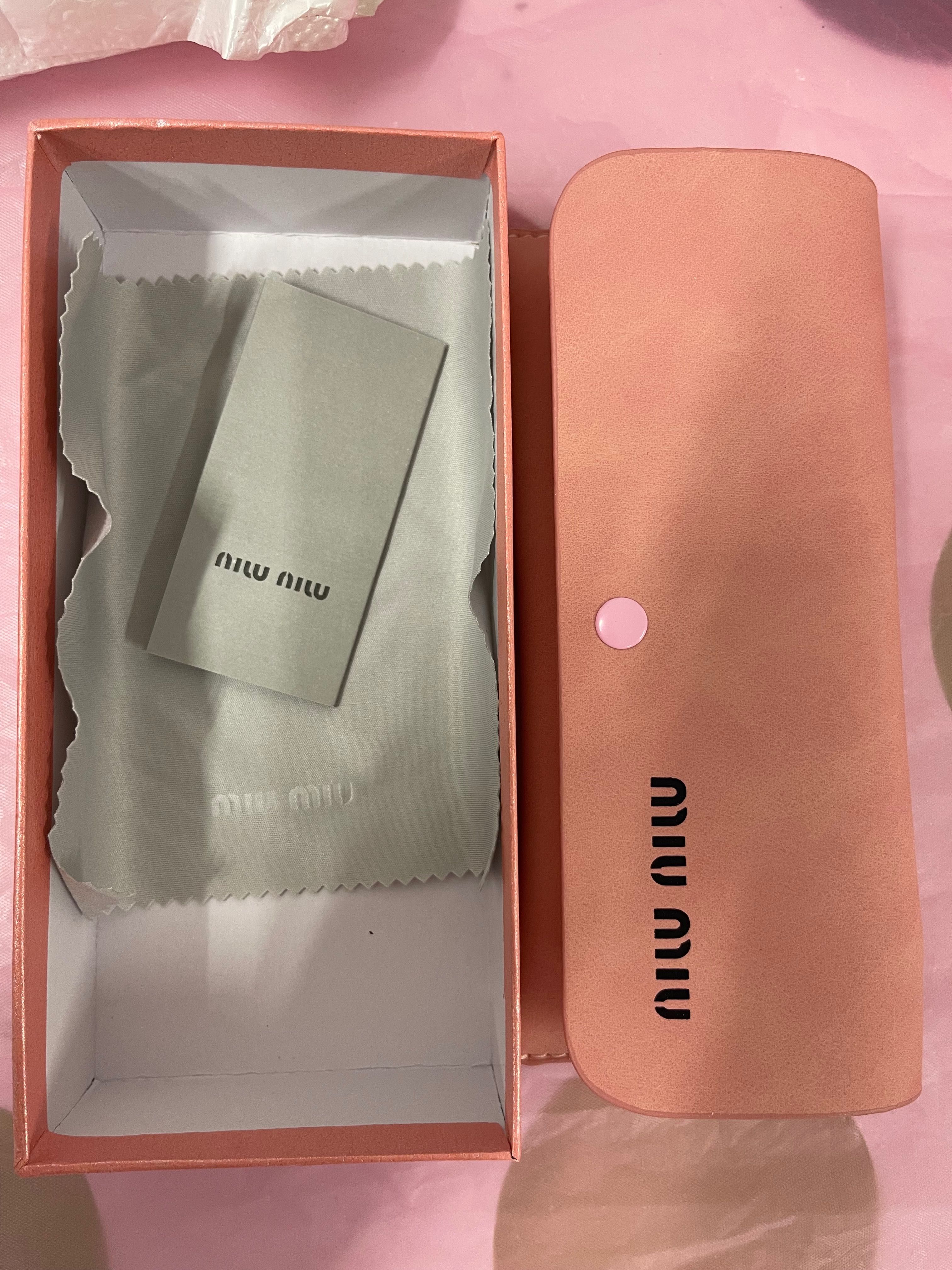 Óculos de sol miu miu
