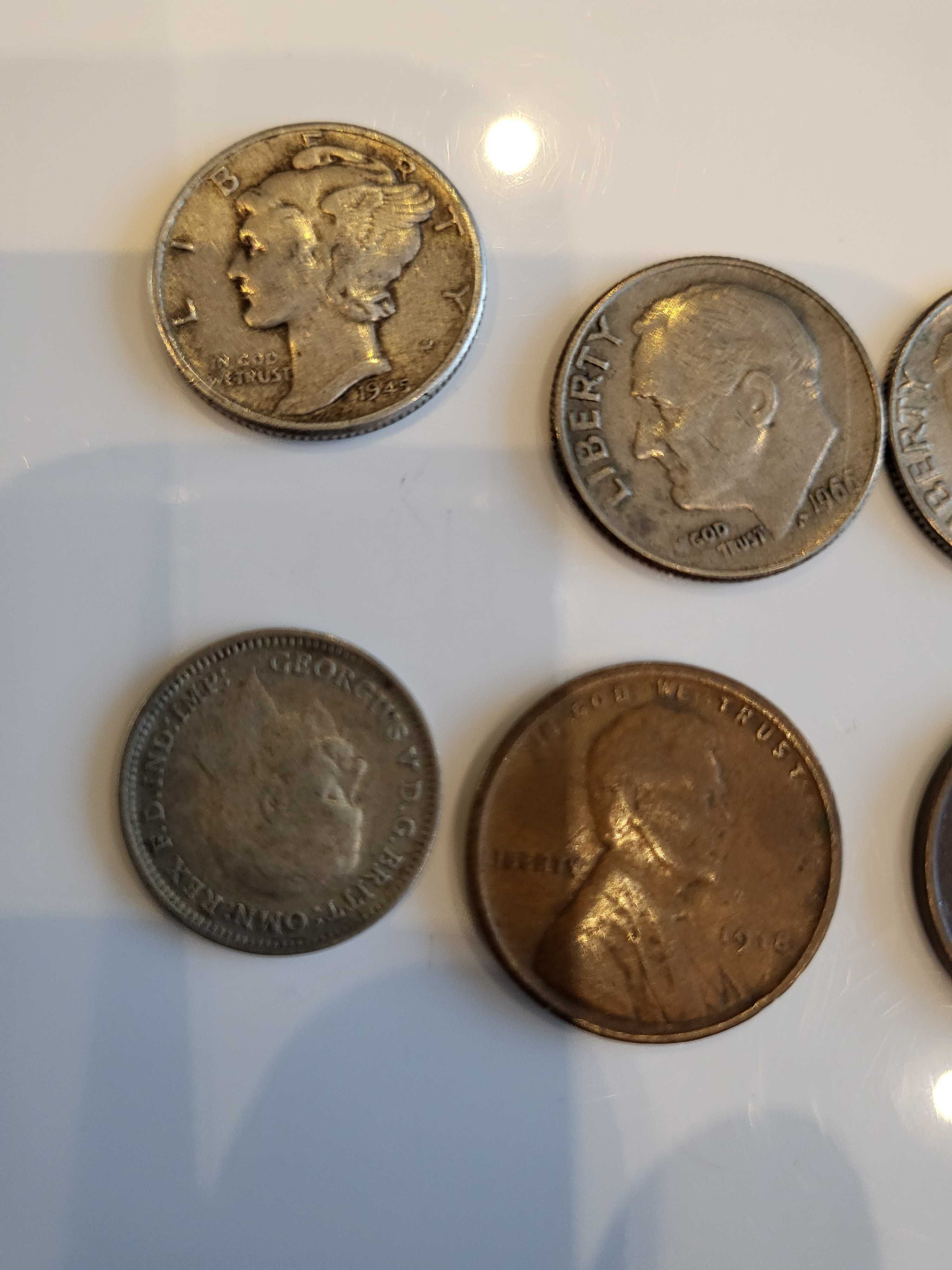 monety one dime , thre pence , one dime