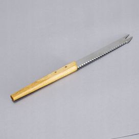 ząbkowany nóż lata 70 stal drewno mosiądz