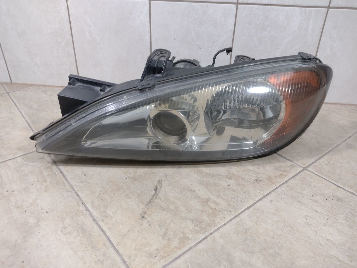 Primera P11 lampa reflektor przód lewy Europa kompletna wysyłka Xenon