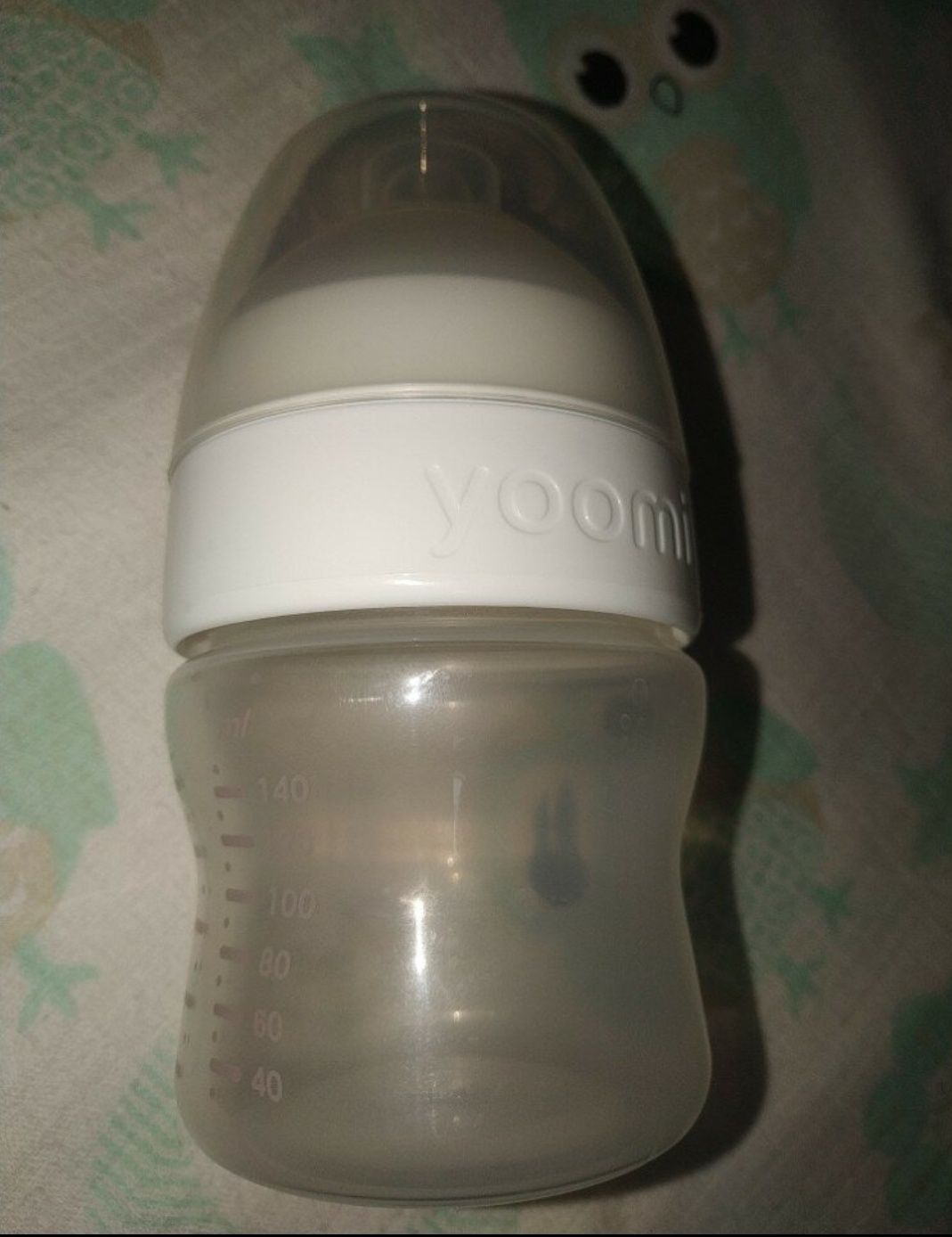 Пляшечка-підігрівач для годування 140мл Yoomi.