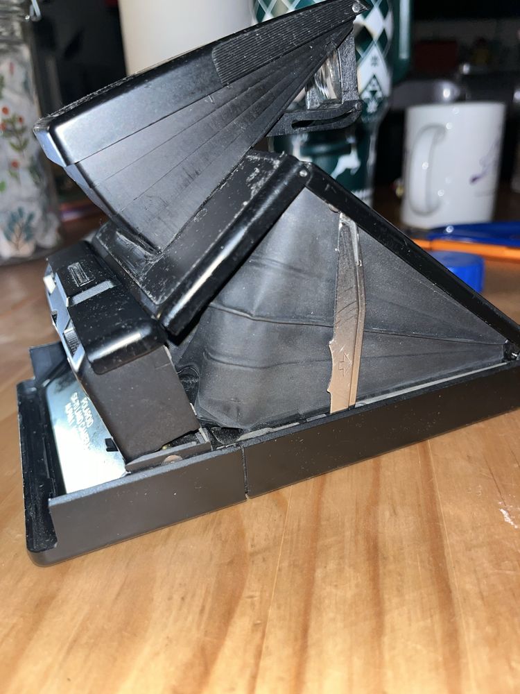 Polaroid SX-70 alpha model 2 uszkodzony ale z filmem