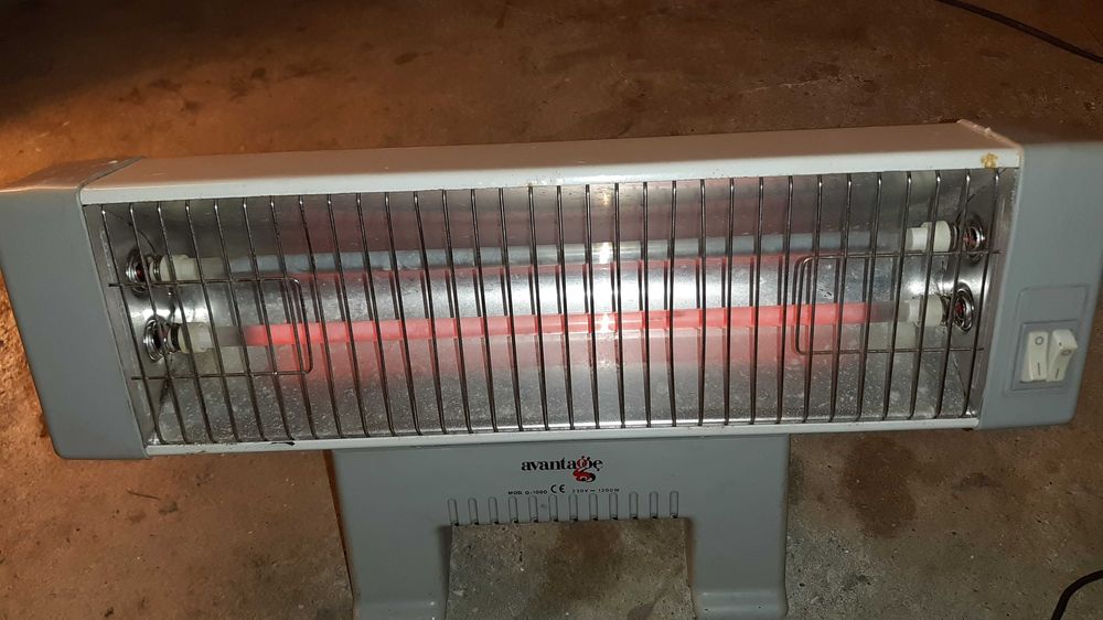 Aquecedor de barras antigo, mas a funcionar bem