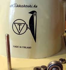 машина швейная Tikka Финляндия белого цвета станина чугунная