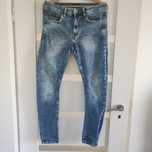 Reserved spodnie jeansowe męskie przecierane skinny 32
