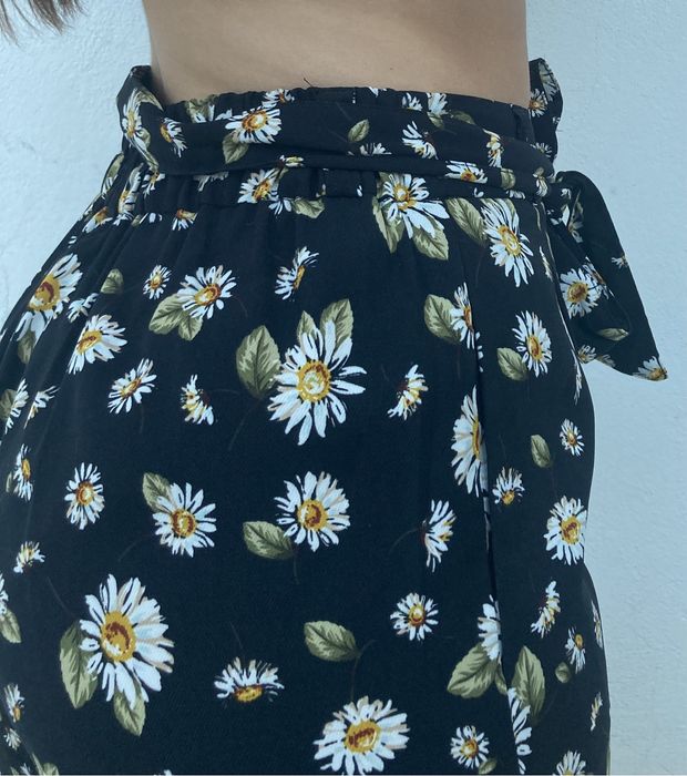 Calças fluídas de senhora