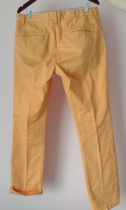 jasno pomarańczowe spodnie Cubus typu chinos - rozmiar W34 L32
