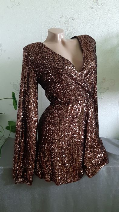 Комбинезон короткий,в паетки