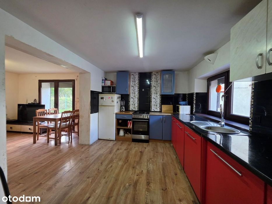 Dom z dużymi budynkami gospodarczymi, działka 60 ar