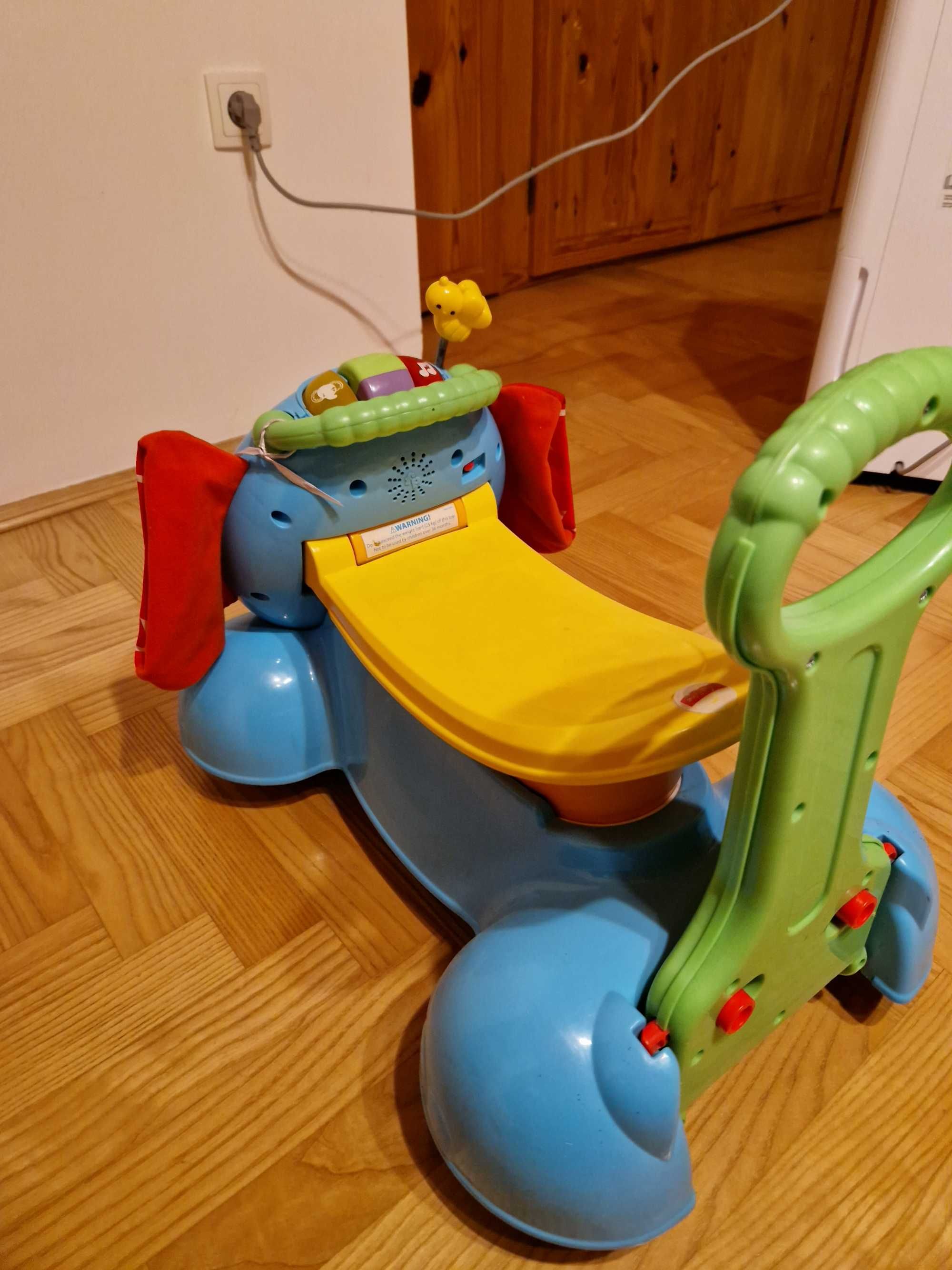 Słoń jeździk pchacz fisher price