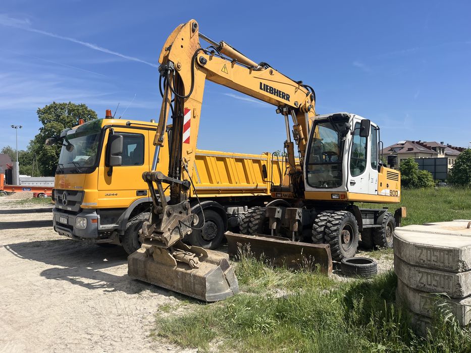 Transport maszyn budowlanych, rolniczych. Pomoc drogowa, laweta wywrot