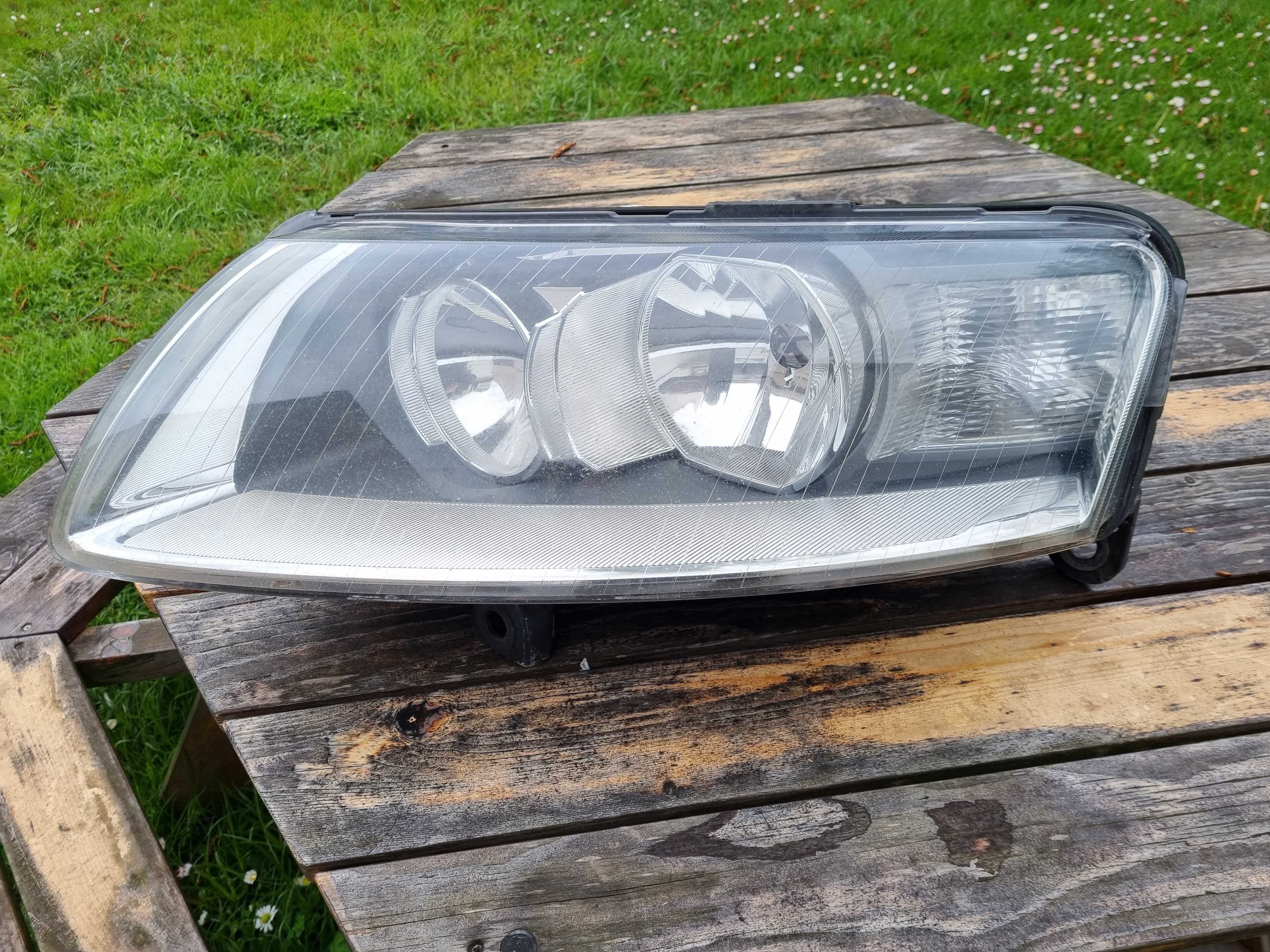 AUDI A6 C6 przed lift (04-08)- LAMPA przednia LEWA Hella zwykła H7 H1