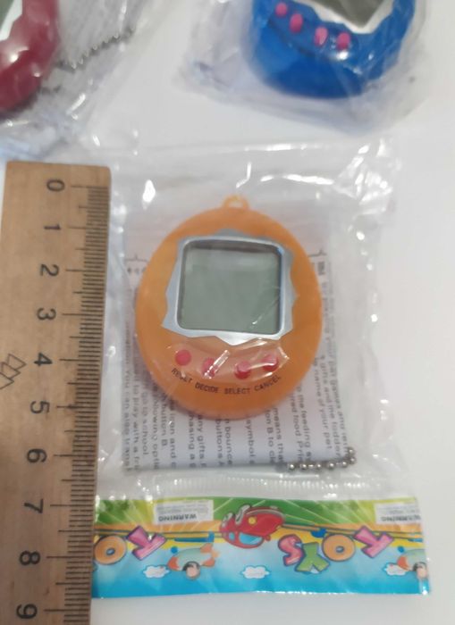 Іграшка тамагочі tamagochi ностальгія брелок 90х