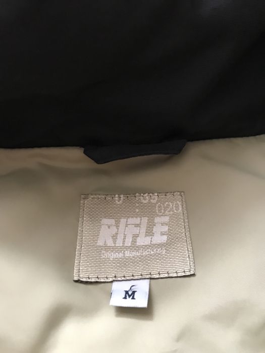 Чоловіча зимова пухова куртка