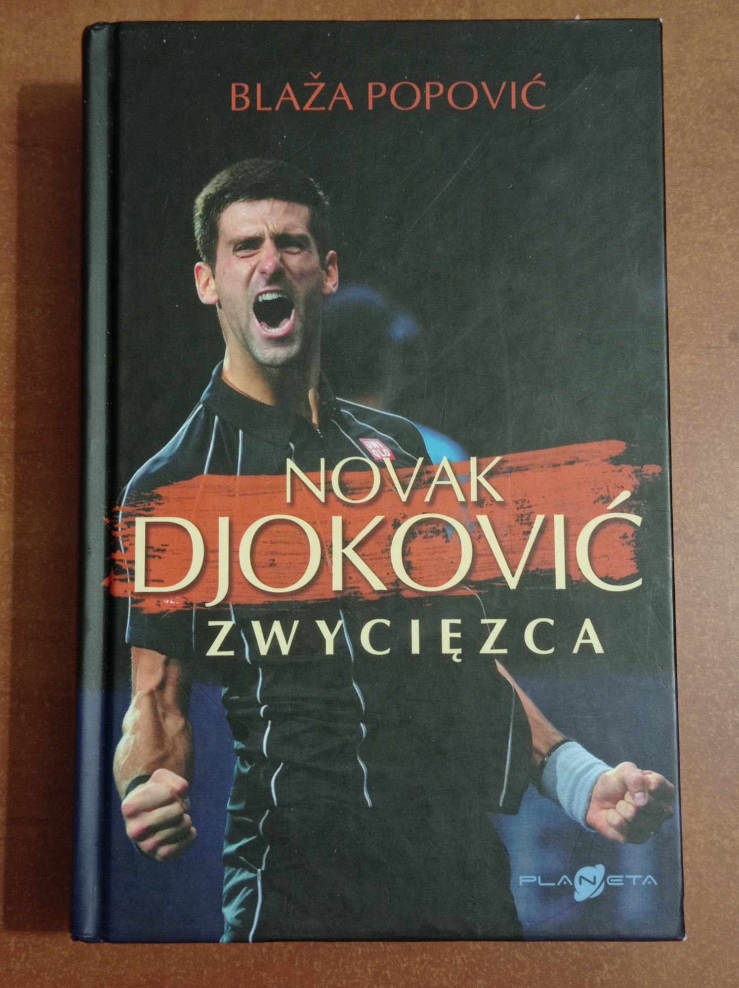 4 książki Novak Djokovic zwycięzca David Bowie Dżem