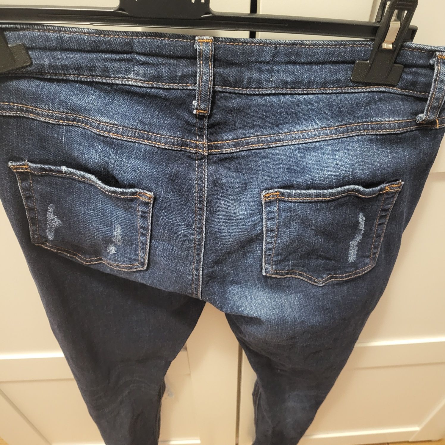 Spodnie jeans dzinsowe z dziurami 38 primark