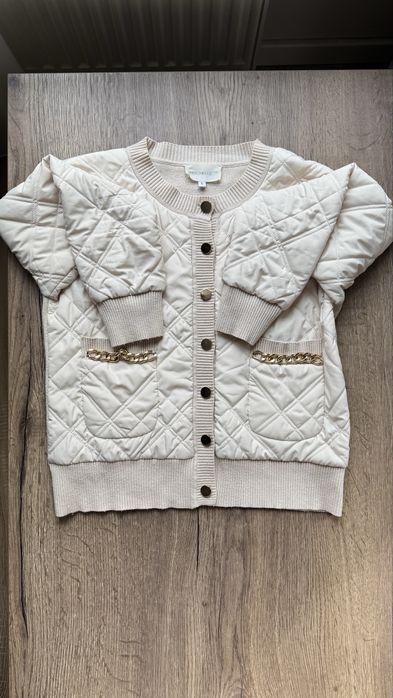 Світлий стьобаний бомбер