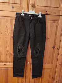 Spodnie Calzedonia S 36 dżinsy jeansy dziury
